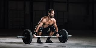 Atleta con posicion de pesista